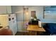 Compact living area with modern conveniences including a mini kitchen, small fridge and comfortable seating at 5409 N Ocean Blvd. # 111, North Myrtle Beach, SC 29582