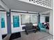 Cozy outdoor patio with seating area, perfect for relaxing and enjoying the fresh air at 5409 N Ocean Blvd. # 111, North Myrtle Beach, SC 29582