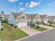 A desirable neighborhood showcasing well-manicured lawns and charming townhouses at 5475 Elba Way # 1601, Myrtle Beach, SC 29579