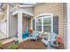 Inviting front porch with rocking chairs, perfect for relaxing outdoors at 5475 Elba Way # 1601, Myrtle Beach, SC 29579