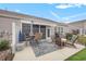Outdoor patio featuring a dining area, seating, grill, and access to the sunroom at 5475 Elba Way # 1601, Myrtle Beach, SC 29579