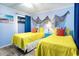 Charming bedroom with two twin beds and coastal decor at 6000 N Ocean Blvd. # 329, North Myrtle Beach, SC 29582