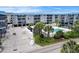 Coastal condominium complex featuring a refreshing swimming pool surrounded by lush landscaping at 6000 N Ocean Blvd. # 329, North Myrtle Beach, SC 29582