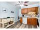 This is a charming kitchen with stainless steel appliances and wood cabinets at 6000 N Ocean Blvd. # 329, North Myrtle Beach, SC 29582