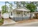 Inviting home with a quaint porch and convenient storage shed at 6001 - 1498 S Kings Hwy., Myrtle Beach, SC 29575