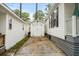 Exterior view of white houses with a concrete driveway at 6001 - 1498 S Kings Hwy., Myrtle Beach, SC 29575