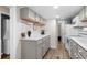 Open kitchen featuring grey cabinets, stainless appliances, and ample counter space at 6001 - 1498 S Kings Hwy., Myrtle Beach, SC 29575