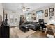 Inviting living room with a comfortable sofa, desk and backyard access at 6001 - 1498 S Kings Hwy., Myrtle Beach, SC 29575