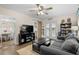 Comfortable living area featuring a sofa, sliding barn door and TV at 6001 - 1498 S Kings Hwy., Myrtle Beach, SC 29575