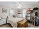 Comfortable main bedroom with a ceiling fan, closet, and soft, natural light at 6001 - 1498 S Kings Hwy., Myrtle Beach, SC 29575