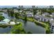 Scenic aerial view of condos, a pool, and a waterway; highlighting the community's beauty at 601 Hillside Dr. N # 3704, North Myrtle Beach, SC 29582