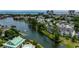 Gorgeous aerial of real estate showing a community with a beautiful pond, fountain, and view to the ocean in the distance at 601 Hillside Dr. N # 3704, North Myrtle Beach, SC 29582