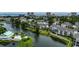 Scenic aerial view of the community with a large lagoon, lush landscaping, and ocean views in the background at 601 Hillside Dr. N # 3704, North Myrtle Beach, SC 29582