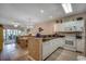 Bright, open kitchen with white cabinets, modern appliances, and seamless access to the living area at 601 Hillside Dr. N # 3704, North Myrtle Beach, SC 29582
