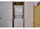 Laundry closet featuring a stacked washer and dryer at 601 Hillside Dr. N # 3704, North Myrtle Beach, SC 29582