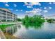 The pond offers a scenic view with a fountain and lush greenery, reflecting the beauty of the community at 601 Hillside Dr. N # 3704, North Myrtle Beach, SC 29582