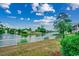 Breathtaking view of a serene pond with a fountain, surrounded by lush greenery, enhancing the natural beauty at 601 Hillside Dr. N # 3704, North Myrtle Beach, SC 29582