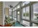 Relaxing sunroom with comfortable seating, lots of natural light, and a beautiful view at 601 Hillside Dr. N # 3704, North Myrtle Beach, SC 29582