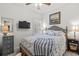 Cozy bedroom with soft lighting, comfortable bed, and charming beach-themed décor at 603 Wave Rider Ln. # 603, North Myrtle Beach, SC 29582