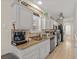Kitchen featuring stainless steel appliances, granite countertops, and white cabinetry at 603 Wave Rider Ln. # 603, North Myrtle Beach, SC 29582