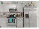 Modern kitchen featuring stainless steel appliances and adjacent to the dining area at 603 Wave Rider Ln. # 603, North Myrtle Beach, SC 29582