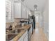 Functional kitchen with stainless appliances, granite countertops and ample cabinet space at 603 Wave Rider Ln. # 603, North Myrtle Beach, SC 29582