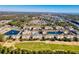 An aerial view of a golf community featuring well-maintained landscaping, water features, and residential buildings at 6203 Catalina Dr. # 212, North Myrtle Beach, SC 29582
