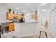 Well-lit kitchen with wood cabinets, stainless steel appliances, and an open layout at 6203 Catalina Dr. # 212, North Myrtle Beach, SC 29582