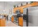 Modern kitchen with wood cabinets, stainless steel appliances, and stylish decor at 6203 Catalina Dr. # 212, North Myrtle Beach, SC 29582