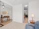 Open-concept living room with a neutral color palette, carpeted floors, and stylish furniture at 6203 Catalina Dr. # 212, North Myrtle Beach, SC 29582