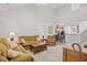 Bright living room with comfortable furniture, a vaulted ceiling, and an open floor plan at 6203 Catalina Dr. # 212, North Myrtle Beach, SC 29582
