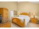Well-lit main bedroom with a high ceiling and coordinating furniture set at 6203 Catalina Dr. # 212, North Myrtle Beach, SC 29582