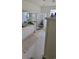 Bathroom featuring a glass shower, white vanity with double sinks and tile flooring at 700 Two Rivers Ct., Myrtle Beach, SC 29579