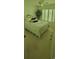 Bedroom featuring neutral carpeting, shutters, and a large potted plant near the bed at 700 Two Rivers Ct., Myrtle Beach, SC 29579