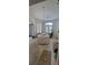 Bright dining room featuring a chandelier, white shutters, and natural light at 700 Two Rivers Ct., Myrtle Beach, SC 29579