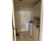 Laundry room with a full-size washer and dryer, and built-in overhead cabinets at 700 Two Rivers Ct., Myrtle Beach, SC 29579