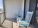Relaxing balcony with two rocking chairs and a view at 701 Norris Dr., Pawleys Island, SC 29585