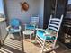 Cozy patio seating area with comfortable chairs and decorative accents. The perfect space to relax at 701 Norris Dr., Pawleys Island, SC 29585