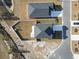 A high angle shot showcasing two houses, driveways, and fenced in yards of this property at 7094 Watercress St, Myrtle Beach, SC 29579