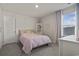 Cozy bedroom featuring a neutral color scheme, plush carpeting, and great natural light at 7094 Watercress St, Myrtle Beach, SC 29579