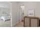Hallway leading to bedroom and powder room, showcasing seamless transition and stylish decor at 7094 Watercress St, Myrtle Beach, SC 29579