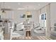 Living room with a view of the dining area and featuring bright, neutral colors at 7094 Watercress St, Myrtle Beach, SC 29579