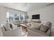 Inviting living room with lots of windows and an open layout at 7094 Watercress St, Myrtle Beach, SC 29579