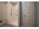 Bathroom with walk-in shower, grab bar, and built-in shelving at 797 Salerno Circle # C, Myrtle Beach, SC 29579
