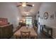 Cozy dining room with wood floors, vaulted ceiling and ceiling fans and view to the living room at 797 Salerno Circle # C, Myrtle Beach, SC 29579