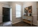 Welcoming entryway with modern decor, a stylish cabinet, and neutral color palette at 797 Salerno Circle # C, Myrtle Beach, SC 29579