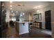 Bright kitchen with large island, stainless steel appliances, and seamless flow into the living areas at 797 Salerno Circle # C, Myrtle Beach, SC 29579