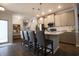 Stylish kitchen with a spacious island, pendant lights, and stainless steel appliances at 797 Salerno Circle # C, Myrtle Beach, SC 29579