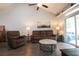Comfortable living room with plush seating and access to outdoor patio at 797 Salerno Circle # C, Myrtle Beach, SC 29579