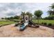 Community playground with slides, climbing structures, and wood chip ground cover at 797 Salerno Circle # C, Myrtle Beach, SC 29579